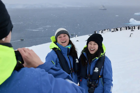 Walking on Antarctica with Penguins