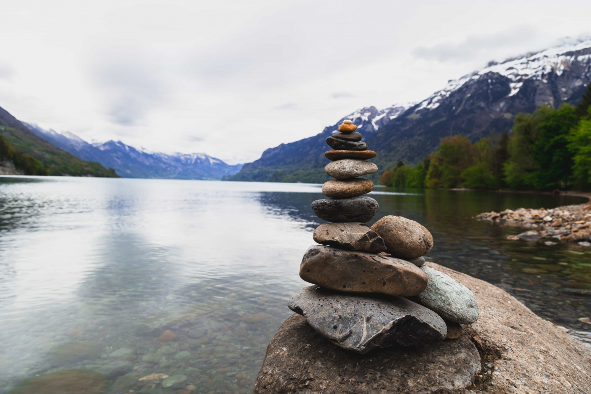 Picture of a stack of rocks balancing by a river